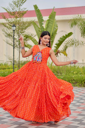 Orange Color Georgette Stitched Gown For Festive